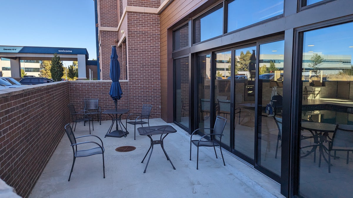 Hampton Inn and Suites Aurora South Denver amenities pool patio
