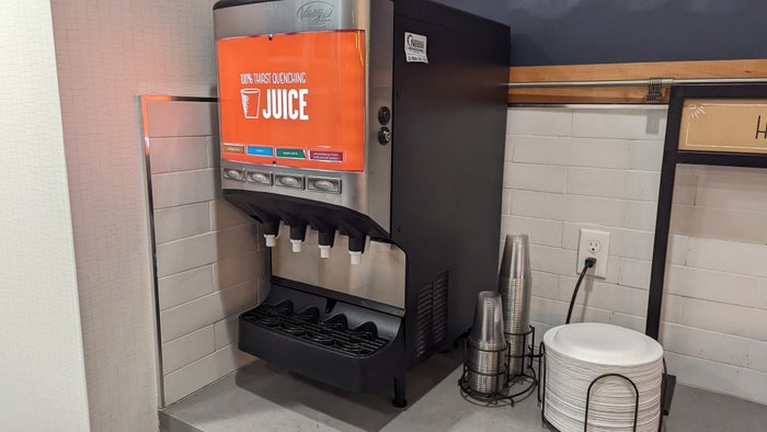 Hampton Inn and Suites Aurora South Denver food and beverage breakfast juice machine Hampton Inn and Suites Aurora South Denver food and beverage breakfast juice machine