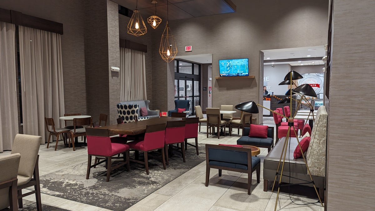 Hampton Inn and Suites Aurora South Denver lobby and breakfast seating