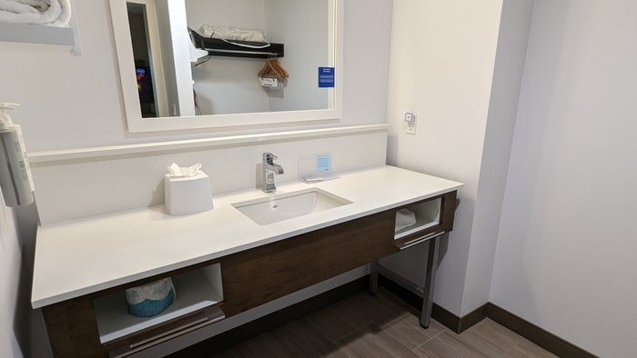 Hampton Inn and Suites Aurora South Denver room bathroom counter and closet Hampton Inn and Suites Aurora South Denver room bathroom counter and closet