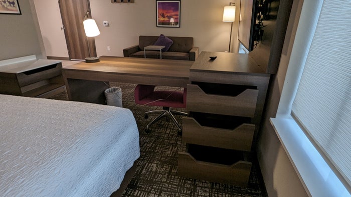 Hampton Inn and Suites Aurora South Denver room entertainment center and desk storage Hampton Inn and Suites Aurora South Denver room entertainment center and desk storage
