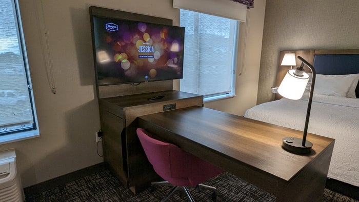 Hampton Inn and Suites Aurora South Denver room entertainment center and desk Hampton Inn and Suites Aurora South Denver room entertainment center and desk
