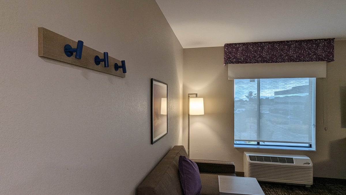 Hampton Inn and Suites Aurora South Denver room entrance hooks