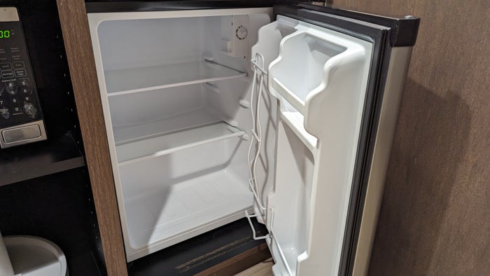 Hampton Inn and Suites Aurora South Denver room entrance mini kitchen mini fridge Hampton Inn and Suites Aurora South Denver room entrance mini kitchen mini fridge