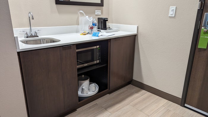 Hampton Inn and Suites Aurora South Denver room entrance mini kitchen Hampton Inn and Suites Aurora South Denver room entrance mini kitchen