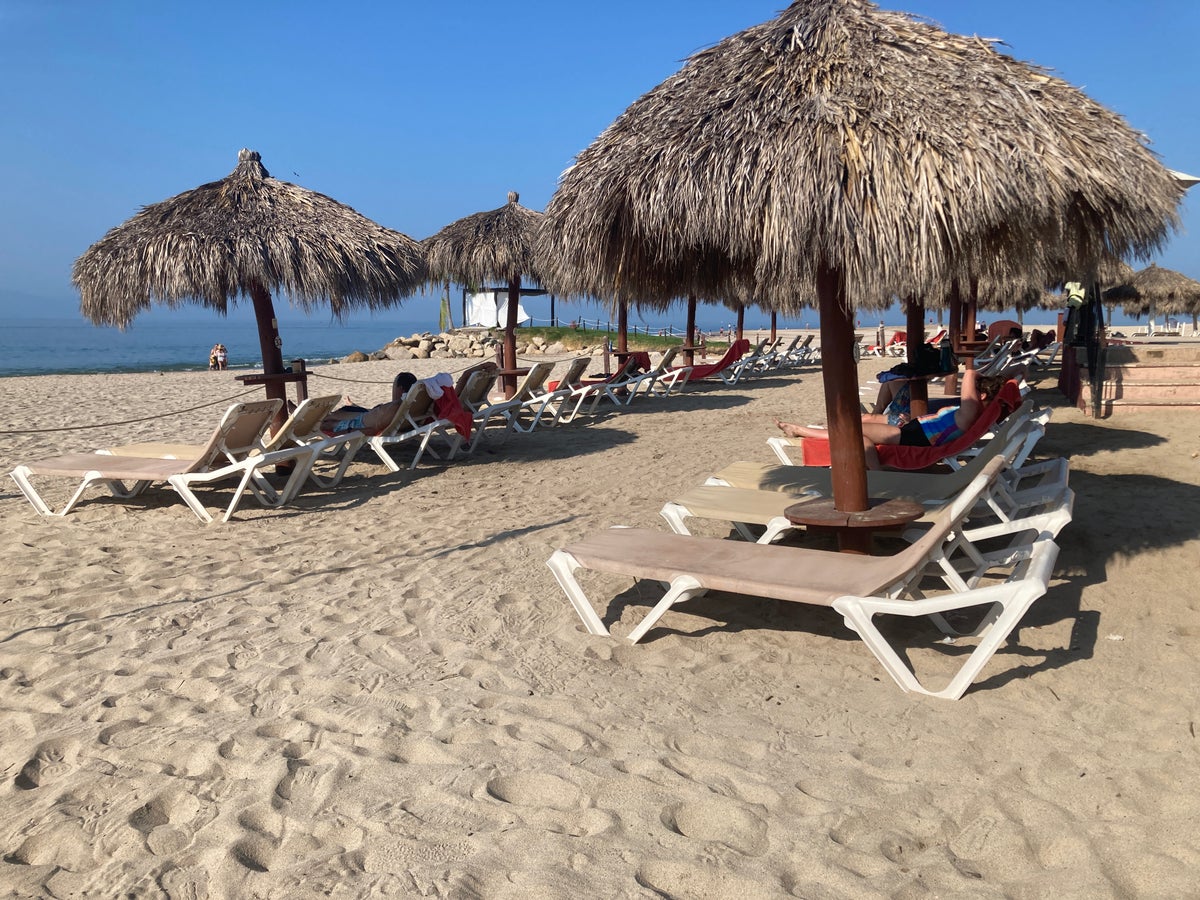 Sunscape Puerto Vallarta Resort Spa beach loungers with umbrellas