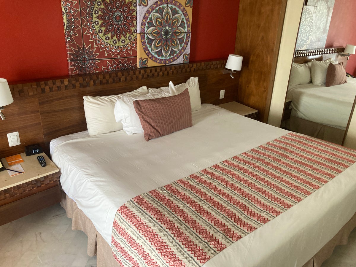 Sunscape Puerto Vallarta Resort Spa standard room bed with headboard
