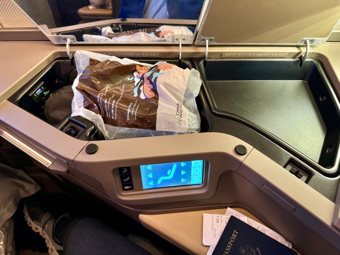 China Airlines A350 Business Class Seat 15K Storage with Amenities China Airlines A350 Business Class Seat 15K Storage with Amenities
