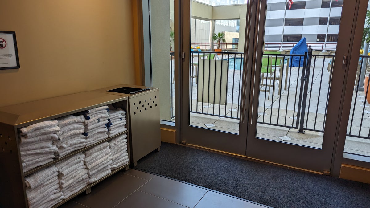 Hampton Inn Houston Downtown amenities pool entrance with towels