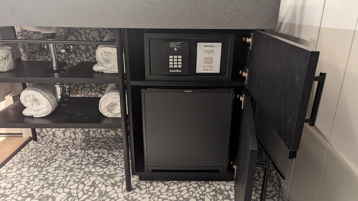 Motto by Hilton New York City Times Square guestroom bathroom fridge and safe Motto by Hilton New York City Times Square guestroom bathroom fridge and safe