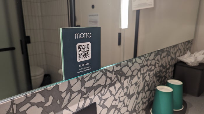 Motto by Hilton New York City Times Square guestroom bathroom mirror information Motto by Hilton New York City Times Square guestroom bathroom mirror information