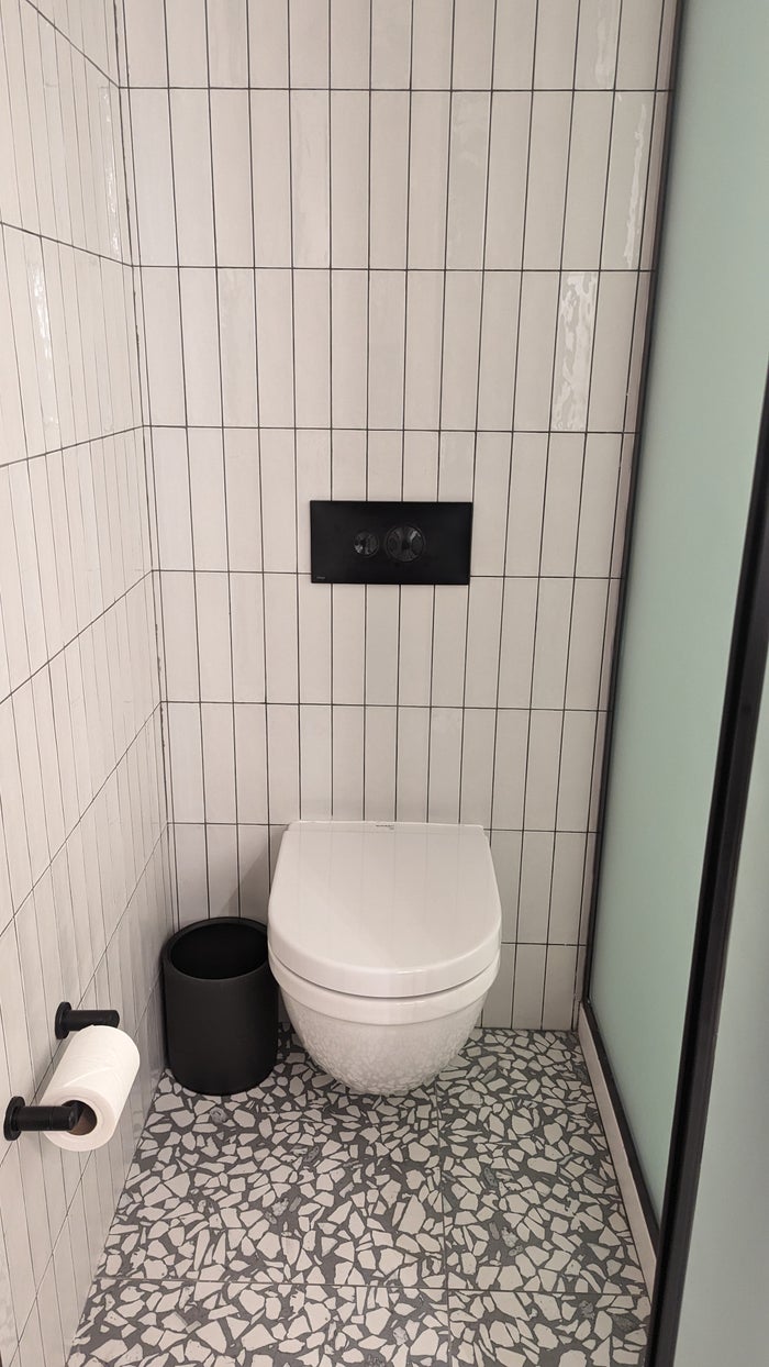 Motto by Hilton New York City Times Square guestroom bathroom toilet enclosure Motto by Hilton New York City Times Square guestroom bathroom toilet enclosure