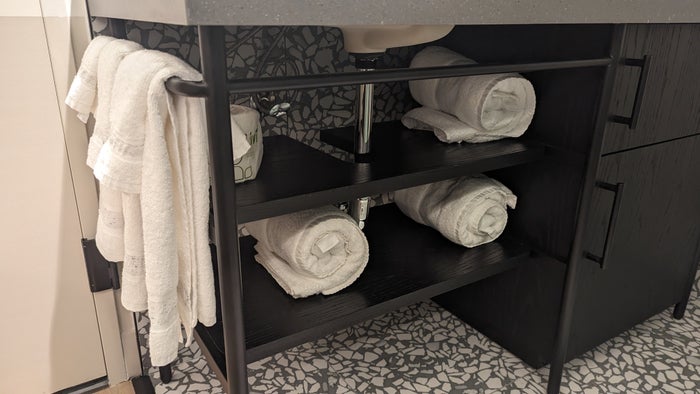 Motto by Hilton New York City Times Square guestroom bathroom towel shelves Motto by Hilton New York City Times Square guestroom bathroom towel shelves