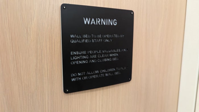Motto by Hilton New York City Times Square guestroom bedroom murphy bed warning Motto by Hilton New York City Times Square guestroom bedroom murphy bed warning