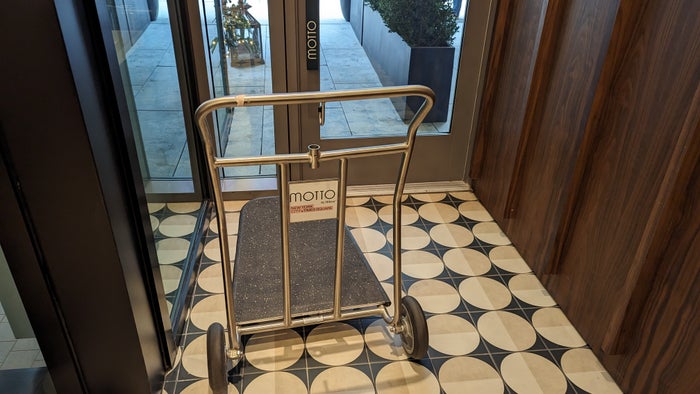 Motto by Hilton New York City Times Square lobby luggage cart Motto by Hilton New York City Times Square lobby luggage cart