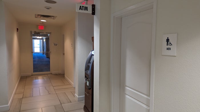 Hilton Pensacola Beach amenities hallway ATM and restrooms Hilton Pensacola Beach amenities hallway ATM and restrooms