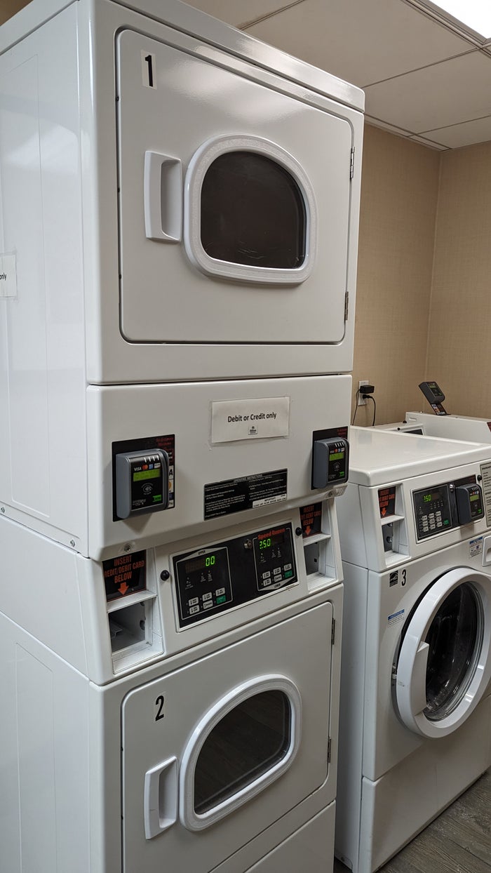 Hilton Pensacola Beach amenities laundry room machines stacked Hilton Pensacola Beach amenities laundry room machines stacked