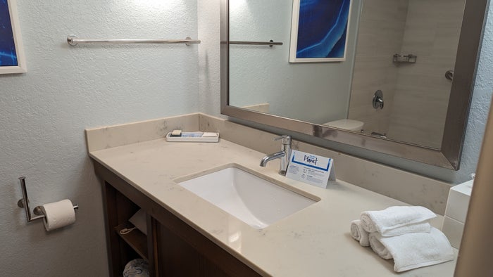 Hilton Pensacola Beach guestroom bathroom sink and mirror Hilton Pensacola Beach guestroom bathroom sink and mirror
