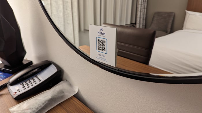 Hilton Pensacola Beach guestroom information mirror and phone Hilton Pensacola Beach guestroom information mirror and phone