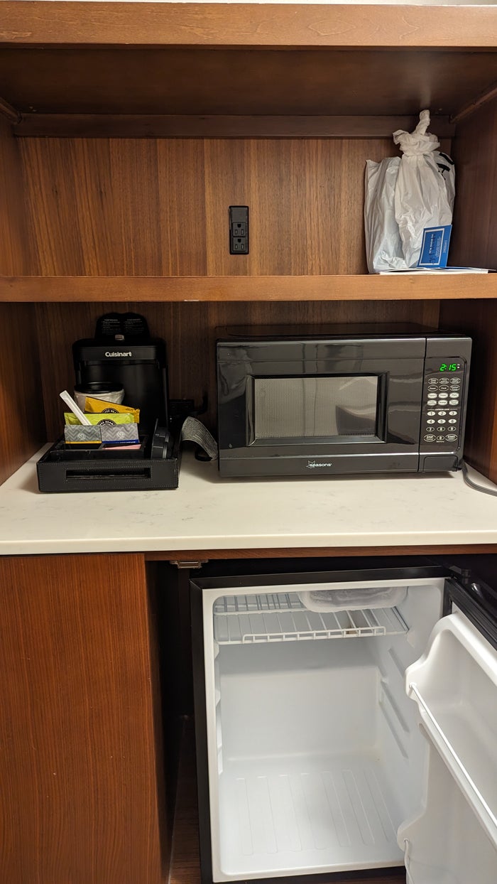 Hilton Pensacola Beach guestroom refrigerator and coffee maker Hilton Pensacola Beach guestroom refrigerator and coffee maker