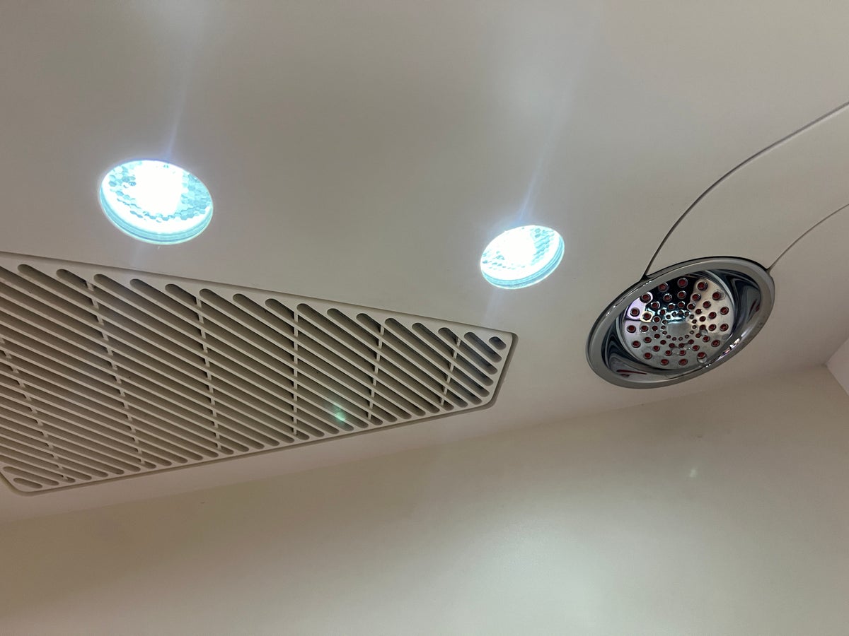 Etihad First Class Apartment shower head and lights