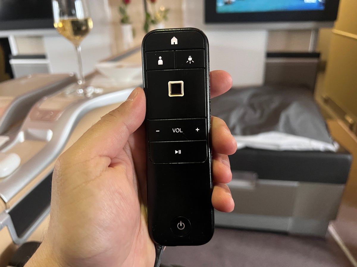 LH F A346 IFE remote in hand