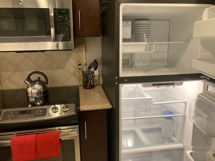 Marriotts Grand Chateau Las Vegas 2BR Villa kitchen with fridge open Marriotts Grand Chateau Las Vegas 2BR Villa kitchen with fridge open