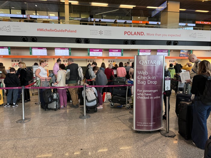 Qatar Airways Warsaw Airport bag drop Qatar Airways Warsaw Airport bag drop