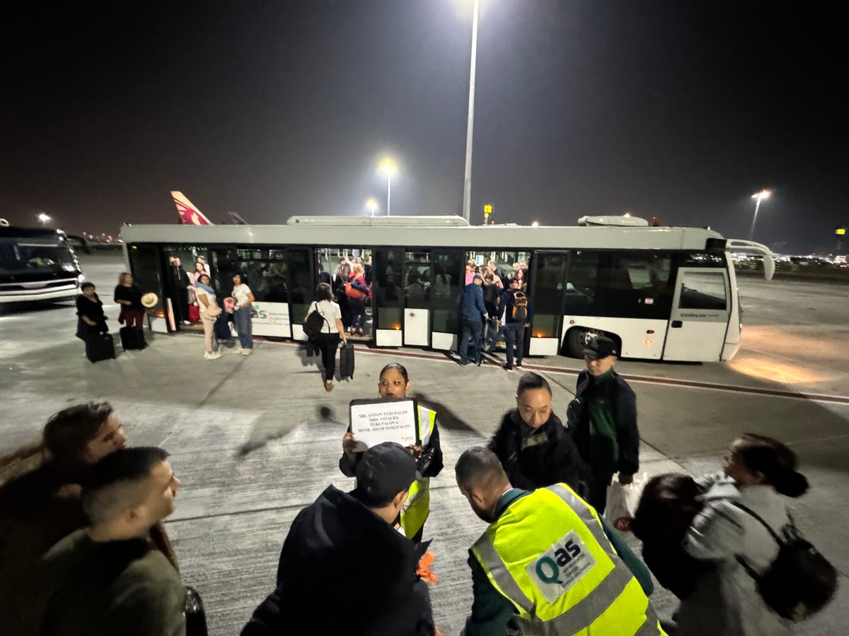 Qatar Airways economy WAW DOH 787 bus on arrival