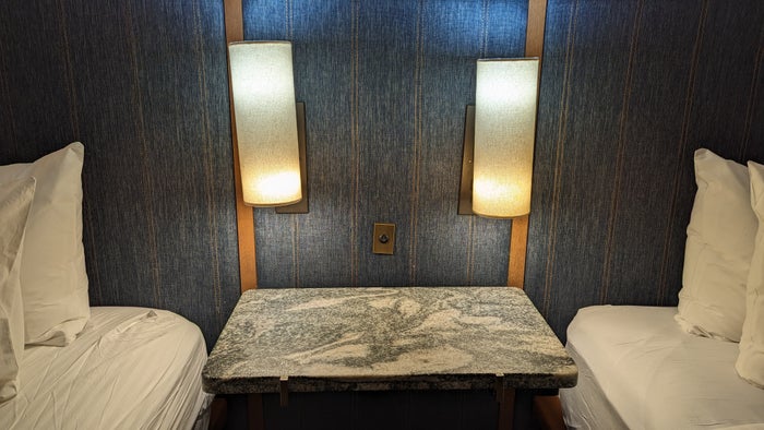 The Troubadour Hotel New Orleans guestroom nightstand with lamps The Troubadour Hotel New Orleans guestroom nightstand with lamps