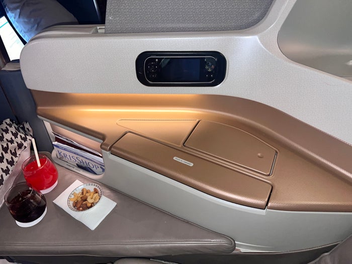 Singapore business 777 armrest and storage area Singapore business 777 armrest and storage area
