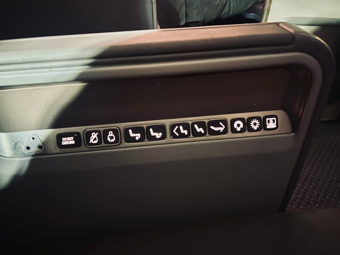 Singapore business 777 full seat controls Singapore business 777 full seat controls