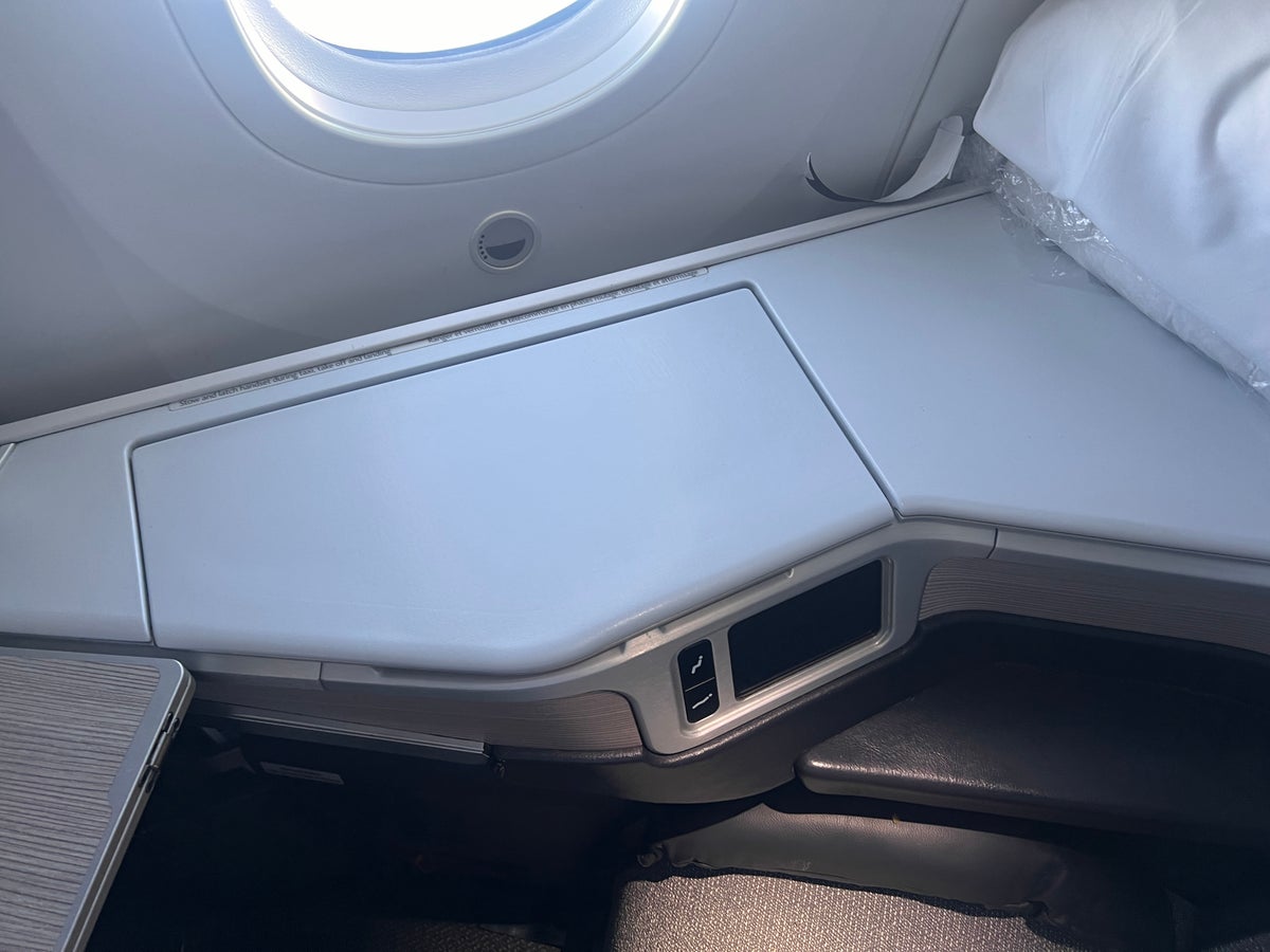 Air Canada business class armrest and storage