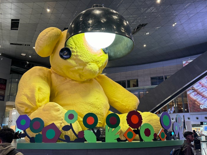 DOH airport yellow bear DOH airport yellow bear