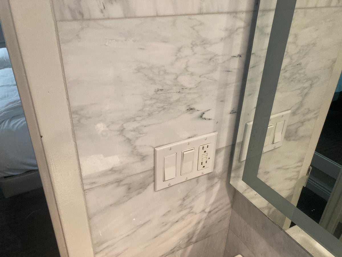 Dream Midtown wall and switches in bathroom