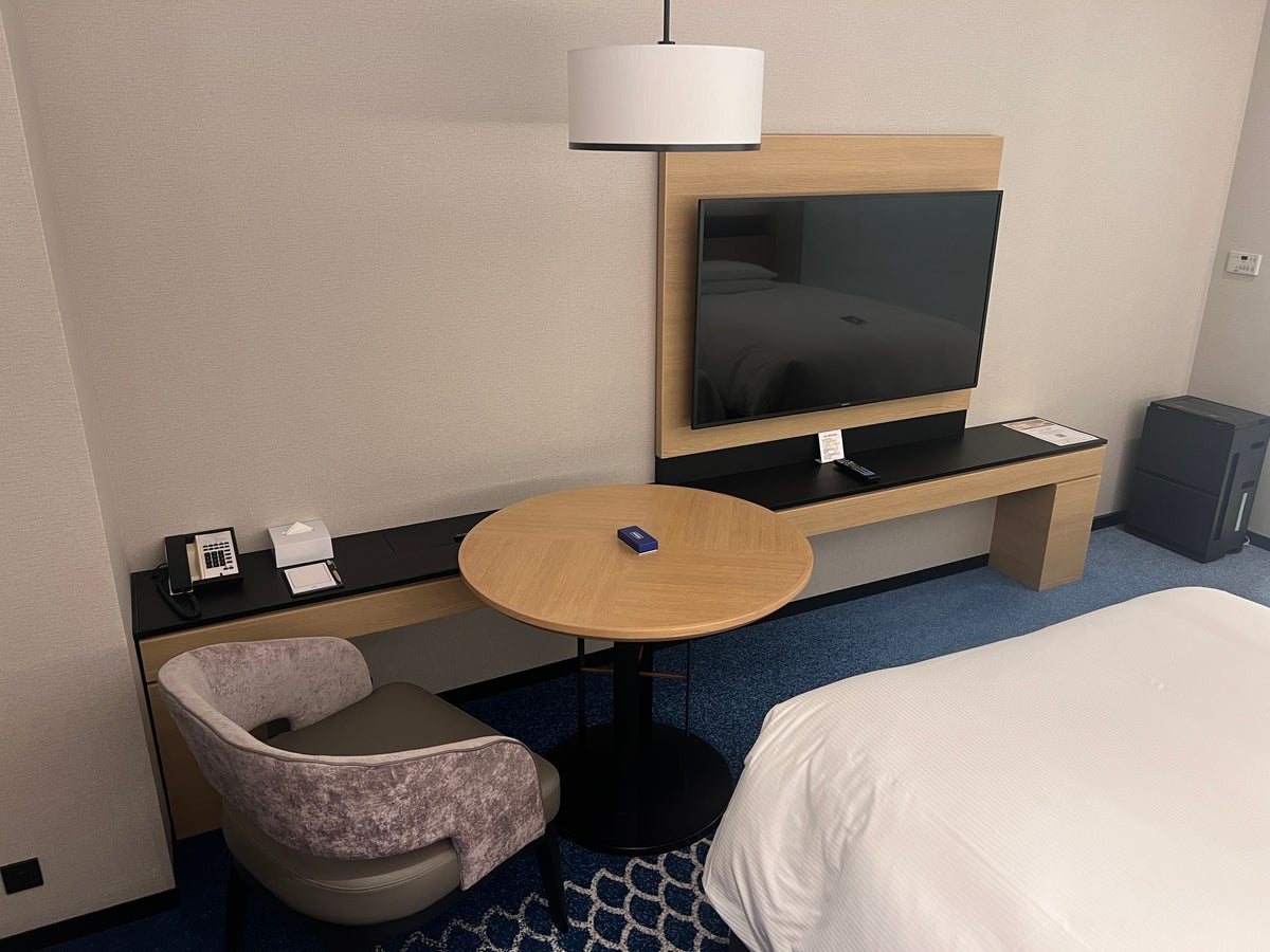 Hilton Tokyo Bay room dining table and mounted TV