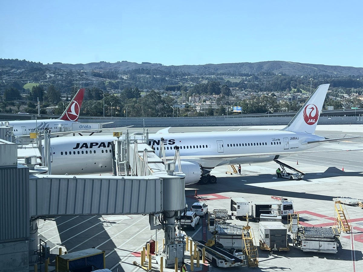 JAL 777 300ER parked at gate at San Francisco Airport
