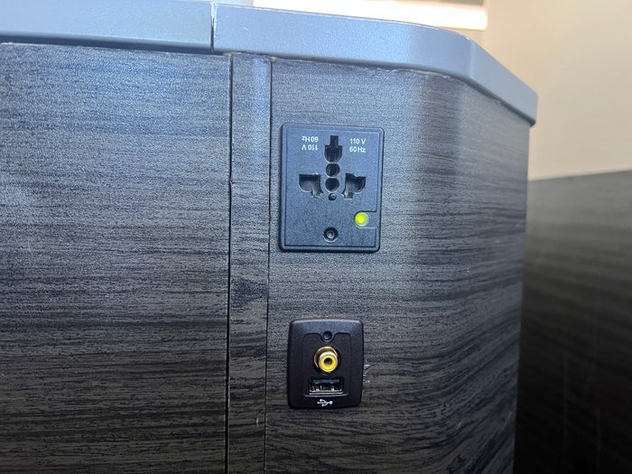 Japan Airlines 777 300er business class AC power outlet Japan Airlines 777 300er business class AC power outlet