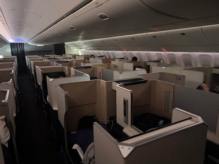 Japan Airlines 777 300er business class cabin from front Japan Airlines 777 300er business class cabin from front