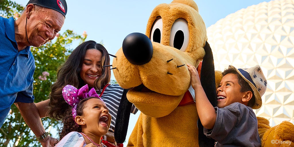 Family with Pluto at EPCOT