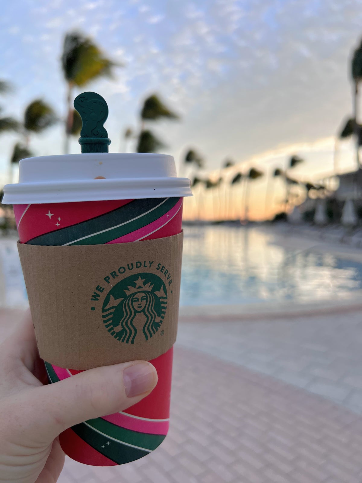 Starbucks coffee in front of the pool