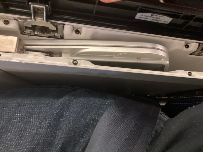 United Boeing 777 200 premium economy bulkhead seat tray table in arm rest