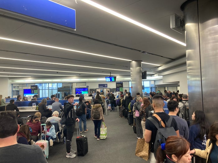 United boarding line at gate 77 for LAX IAD flight