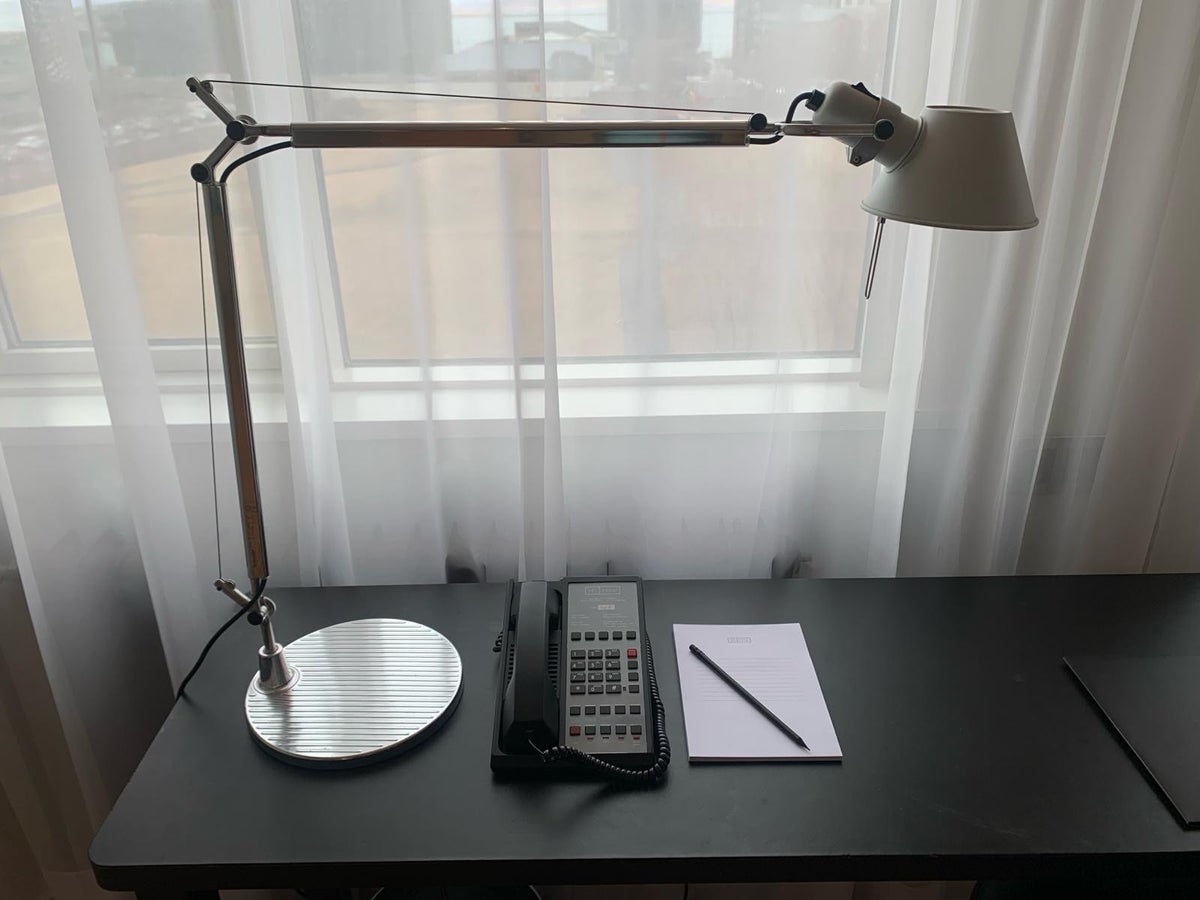 101 Hotel Reykjavik bedroom desk with lamp and phone