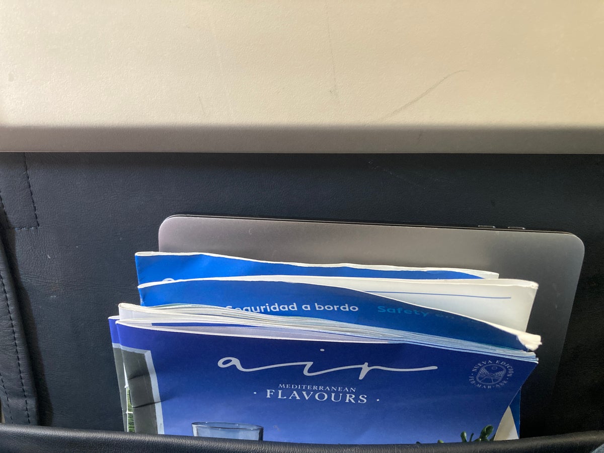 Air Europa laptop and documents in seat back pocket