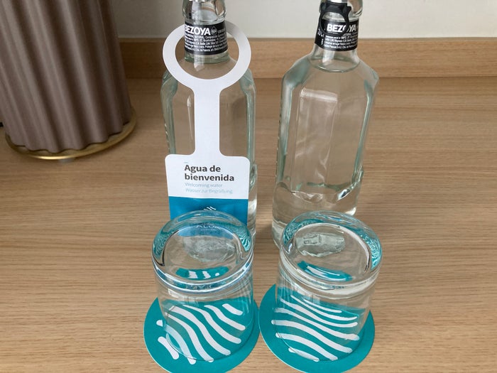 AluaSoul Costa Malaga bedroom water and glasses AluaSoul Costa Malaga bedroom water and glasses