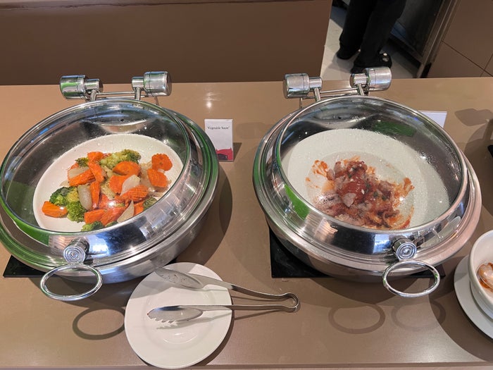Hilton Garden Inn Bangkok Silom All Day Dining vegetable sautee and grilled pork Hilton Garden Inn Bangkok Silom All Day Dining vegetable sautee and grilled pork