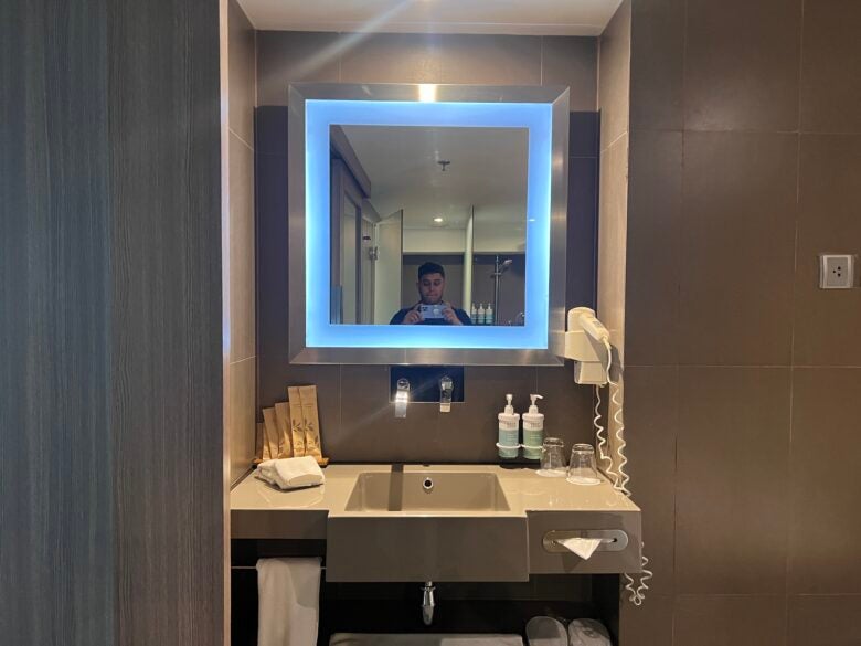Hilton Garden Inn Bangkok Silom bathroom vanity and mirror