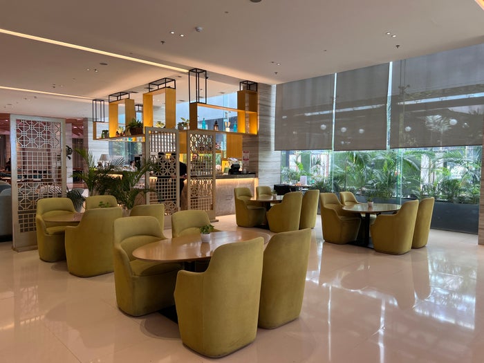 Holiday Inn Express Manila Newport City lobby seating next to bar Holiday Inn Express Manila Newport City lobby seating next to bar