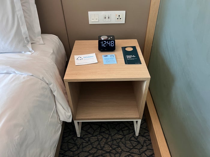 Holiday Inn Express Manila Newport City nightstand with alarm clock Holiday Inn Express Manila Newport City nightstand with alarm clock